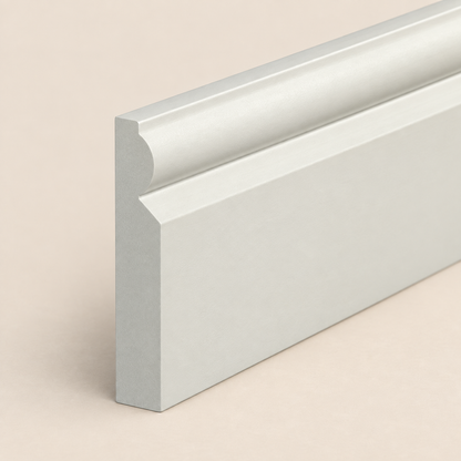 Taurus Skirting Board profile detail on a warm limestone background